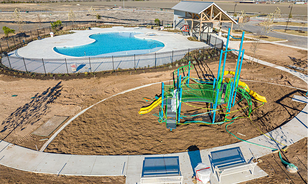 frontal view of poolside and landscape construction design at lily springs