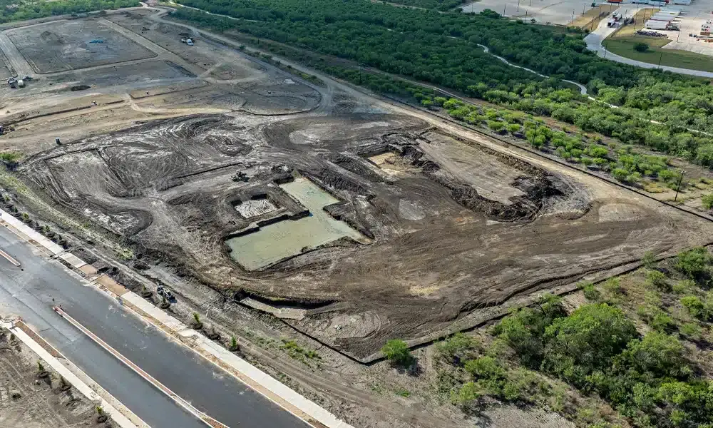 Espada-Amenity-Center-breaking-groud-aerial-view-3cs-construction