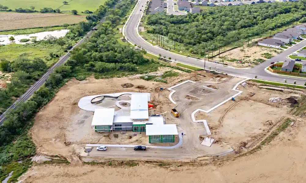 Stone-Garden-Amenity-Center-aerial-full-view-progress-surrounding-neighborhoods-3cs-Construction