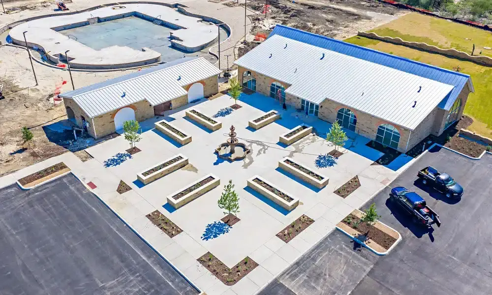 Espada-Amenity-Center-full-aerial-view-water-feature-raised planters-3cs-construction